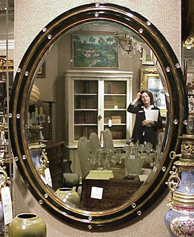 Lot image - Regency Style Gilt-Decorated Oval Mirror