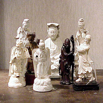 Lot image - Group of Eight Asian Ceramic and Wood Figures