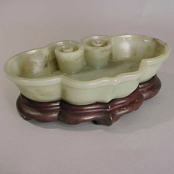 Lot image - Jade Ruyi-Form Brushwasher, early 20th century with wood base