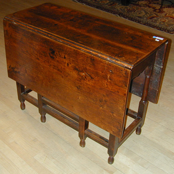 Lot image - Provincial George III Oak Gate-Leg Table