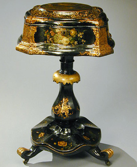 Lot image - Victorian Gilt-Decorated Mother-of-Pearl Inlaid and Painted Papier Mache Tea Poy