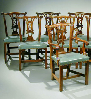 Lot image - Set of Twenty-Five George III Style Mahogany Dining Chairs
