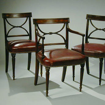 Lot image - Set of Fourteen Regency Mahogany Dining Chairs