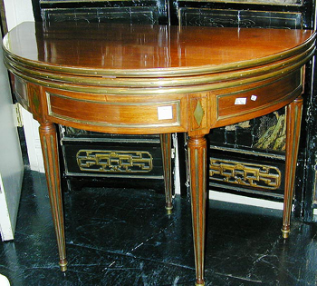 Lot image - Louis XVI Brass Bound Mahogany Triple-Fold Games Table