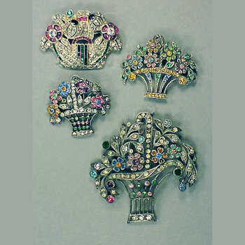 Lot image - Four Sterling Silver Basket Pins