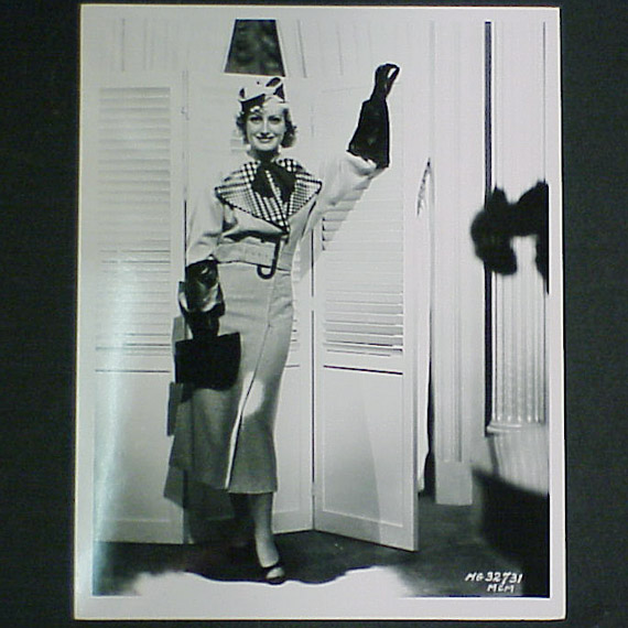 Lot image - CRAWFORD, JOAN Collection of approximately 550 still photographs, vintage prints or later copies, including many with studio identifica