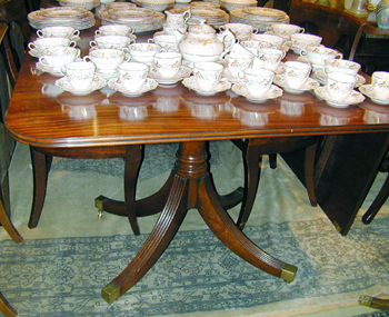 Lot image - George III Style Mahogany Double-Pedestal Extension Dining Table