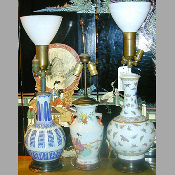 Lot image - Two Chinese Polychrome Decorated Porcelain Lamps Together with a Chinese Blue and White Porcelain Lamp