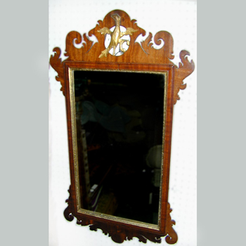 Lot image - George III Mahogany and Parcel Gilt Mirror