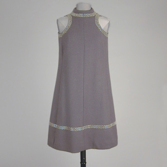 Lot image - Geoffrey Beene Gray Flannel Cocktail Dress American, 1960s