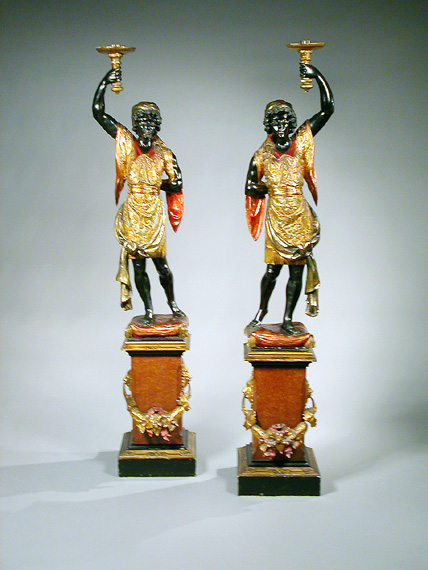 Lot image - Pair of Italian Gilt and Painted Wood Blackamoors on Stands