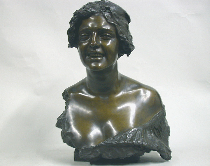 Lot image - Bronze Bust of a Smiling Woman