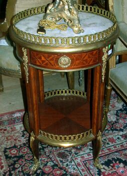 Lot image - Pair of Louis XVI Style Gilt-Bronze Mounted Mahogany Side Tables