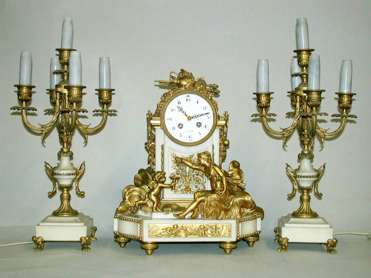 Lot image - Louis XVI Style Gilt-Bronze and Marble Clock Garniture
