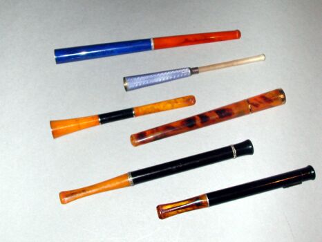 Lot image - Collection of Six Fine Cigarette Holders