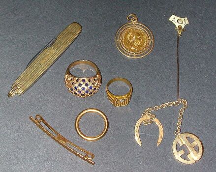 Lot image - Group of Assorted Gold Items  14 kt. yellow gold, comprising a wedding band, a signet ring and a dome-shaped ring, two pend...
