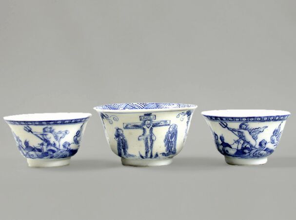 Lot image - THREE CHINESE EXPORT BLUE AND WHITE EUROPEAN SUBJECT PORCELAIN TEA BOWLS  Qianlong Period, circa 1765-1775  Diameters 2 5/8, 3 1/8 inch