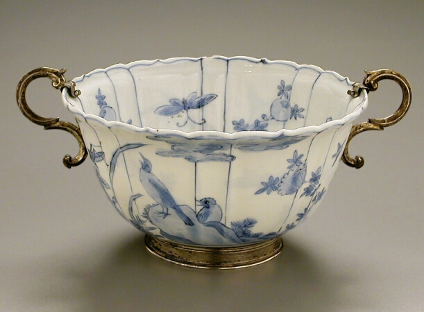 Lot image - CHINESE EXPORT BLUE AND WHITE EGGSHELL PORCELAIN SHAPED BOWL IN DUTCH SILVER MOUNTS  The porcelain late 17th century  Diameter 5 5/8 in