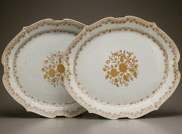 Lot image - PAIR OF CHINESE EXPORT GILT DECORATED PORCELAIN PLATTERS  Circa 1740  Length 19 7/8 inches (50.5 cm)