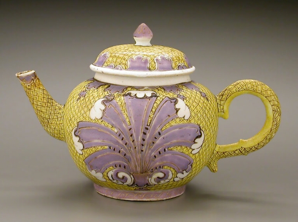 Lot image - RARE CHINESE EXPORT ENAMELED YELLOW GROUND PORCELAIN TEAPOT AND COVER  Qianlong Period, circa 1740  Height 4 3/4 inches (12.1 cm)
