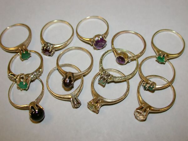 Lot image - Group of Thirteen Assorted Single Stone Rings