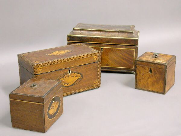 Lot image - Group of Four George III Inlaid Mahogany Tea Caddies
