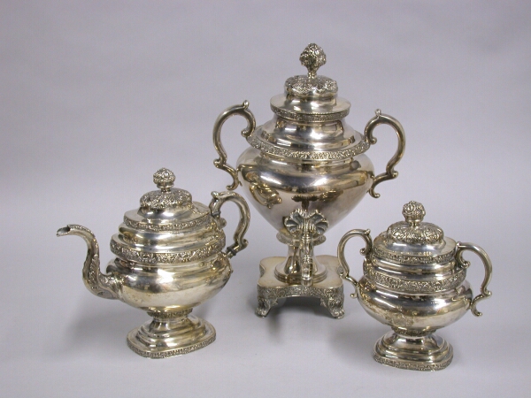 Lot image - Classical Coin Silver Tea Service Hot water ewer Ball, Black & Hughes, New York, teapot and sugar I. W. Forbes, New York