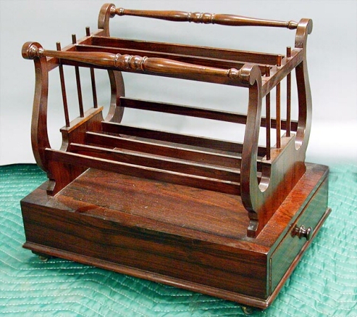 Lot image - Victorian Rosewood Canterbury With lyre-form ends above a single drawer.