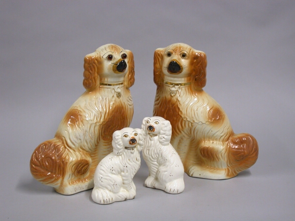 Lot image - Two Pairs of Staffordshire Pottery Spaniels