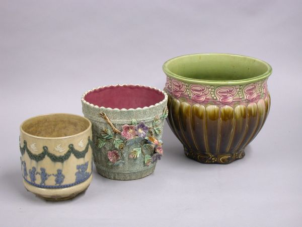 Lot image - Group of Three Majolica Pottery Flower Pots; Together with a Glazed Tileware Rectangular Jardiniere