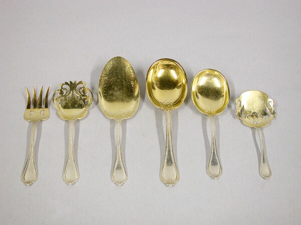 Lot image - Group of Six Gilt Sterling Silver Serving Pieces