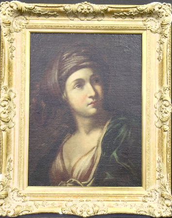 Lot image - Italian School 17th Century HEAD OF A SYBIL   Oil on canvas 24 1/4 x 17 1/2 inches (61.6 x 44.5 cm.)