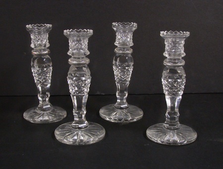 Lot image - Set of Four Colorless Cut Glass Candlesticks