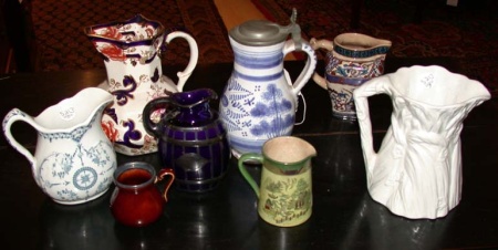 Lot image - Group of Eight English and Continental Porcelain Ewers