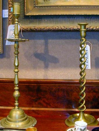 Lot image - Two Pairs of Brass Candlesticks