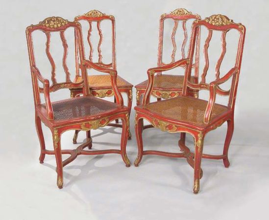 Lot image - Set of Eight Continental Rococo Style Gilt Decorated Red Painted Dining Chairs