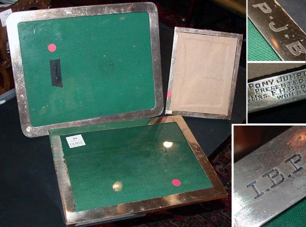 Lot image - Group of Three Sterling Silver Photograph Frames