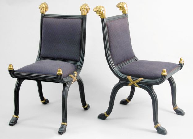 Lot image - Set of Eight Neoclassical Style Parcel Gilt and Black Painted Dining Chairs