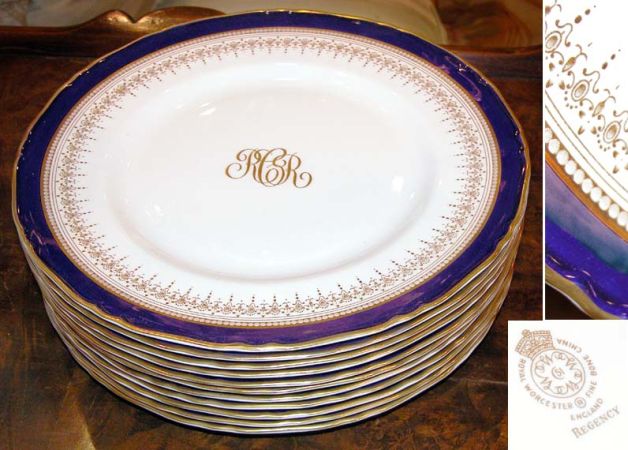 Lot image - Set of Eleven Royal Worcester Gilt Decorated Cobalt Blue Porcelain Service Plates