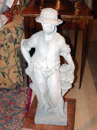 Lot image - Stone Garden Figure of a Boy in a Hat with Basket