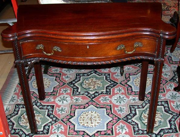 Lot image - Georgian Style Mahogany Serpentine Front Fold-Over Game Table