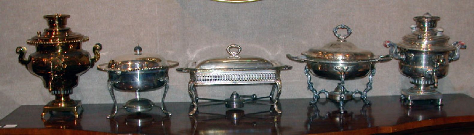 Lot image - Four Silver Plated Serving Dishes; Together with a Brass Samovar
