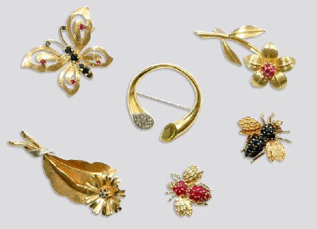 Lot image - Six Gold and Gem-Set Pins