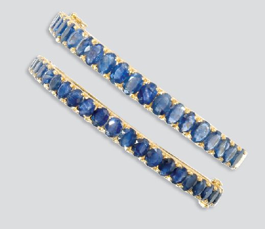 Lot image - Pair of Gold and Sapphire Bangles