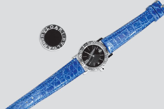 Lot image - Stainless Steel Wristwatch and White Gold and Onyx Ring