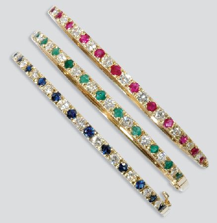 Lot image - Three Gold, Diamond and Gem-Set Bangles