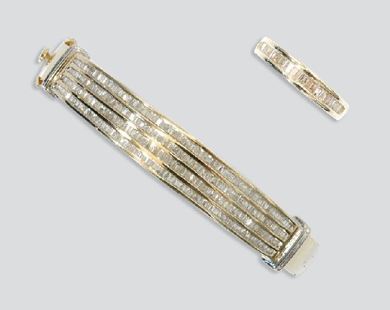 Lot image - Gold and Diamond Bangle and Ring