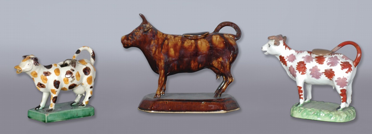 Lot image - Four English Pottery Cow Creamers