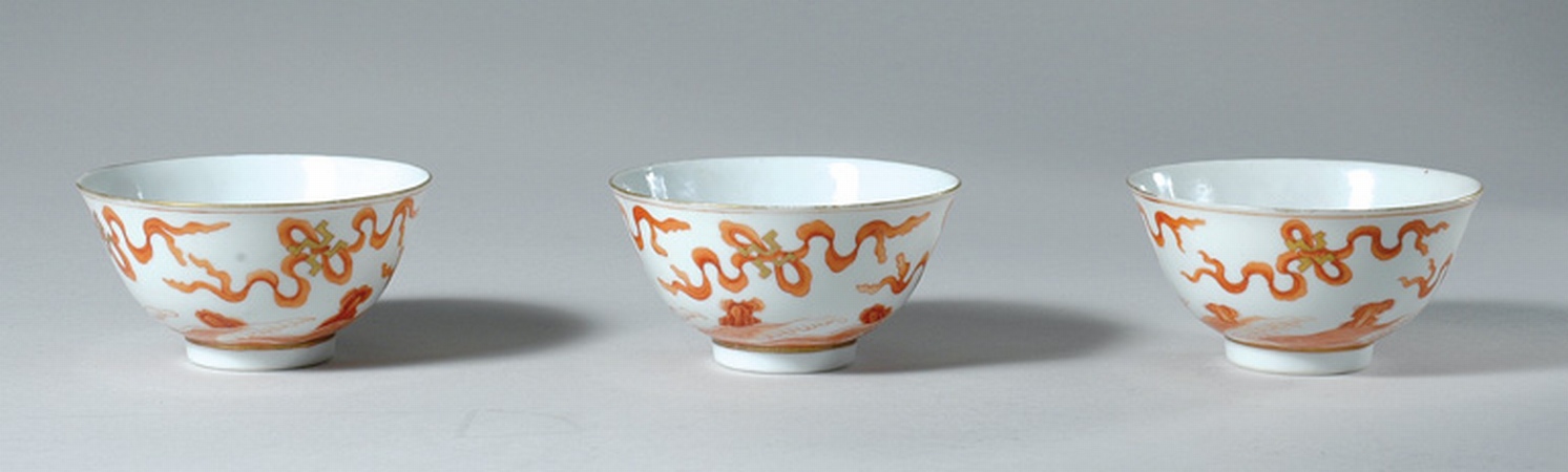 Lot image - Three Enamel Red and Gilt Porcelain Cups