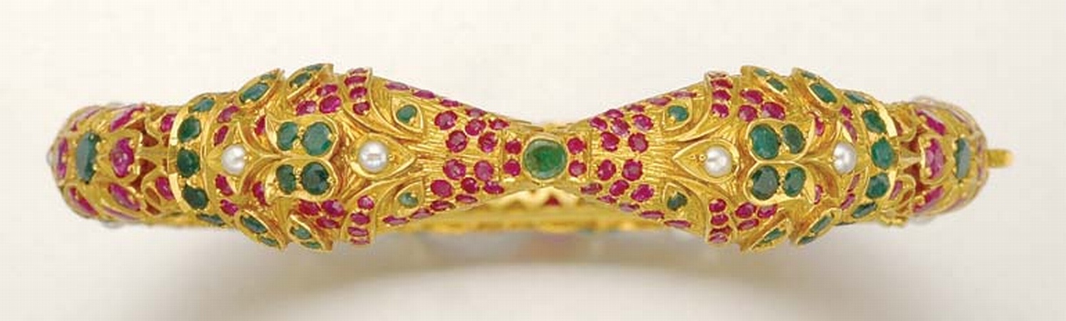 Lot image - Indian Gold, Gem-Set and Split Pearl Bangle
